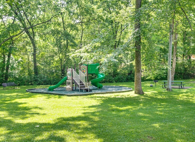 view of jungle gym with a lawn