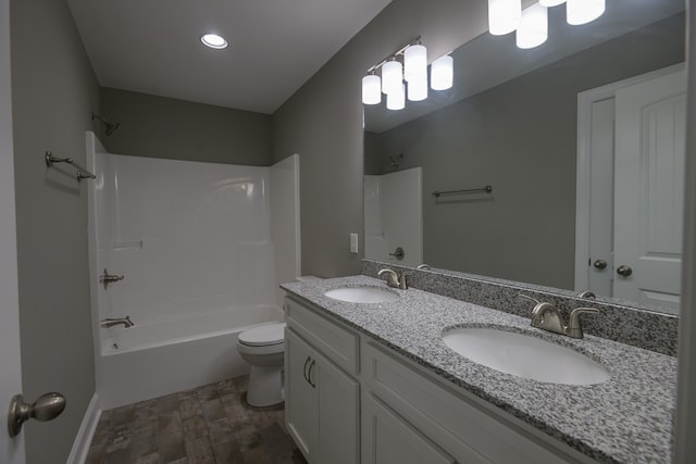 full bathroom featuring tub / shower combination, hardwood / wood-style floors, vanity, and toilet