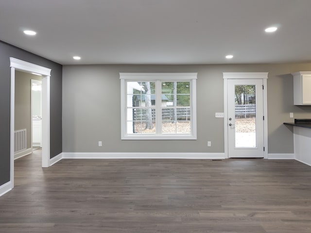 interior space featuring dark wood-type flooring