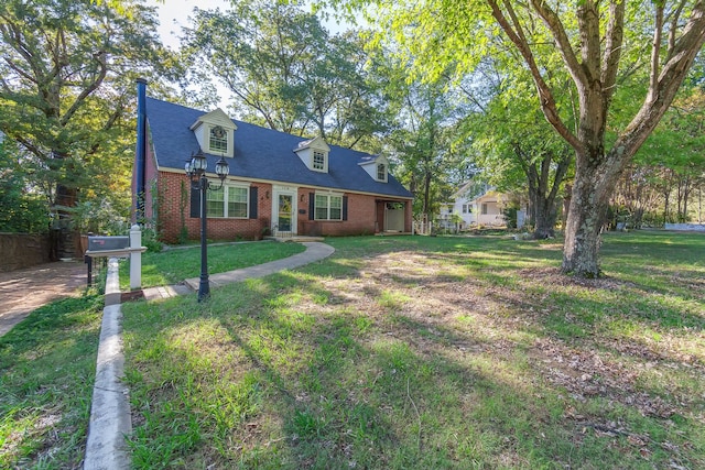 new england style home featuring a front lawn