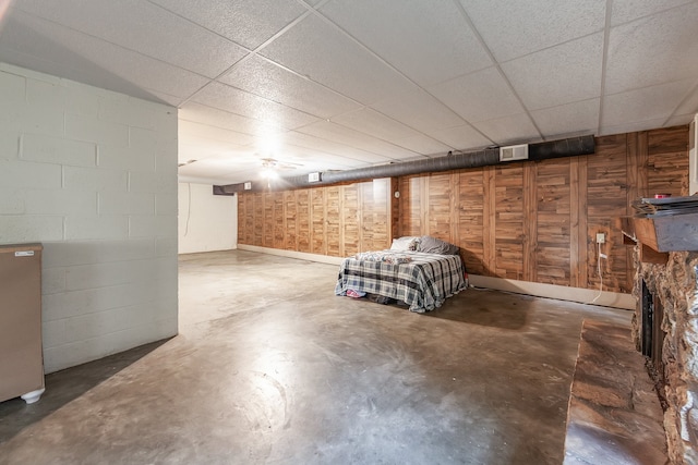 garage with wood walls