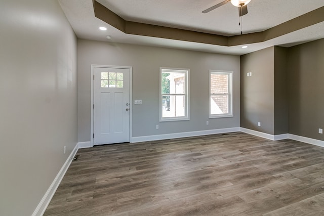 foyer entrance featuring ceiling fan and hardwood / wood-style flooring