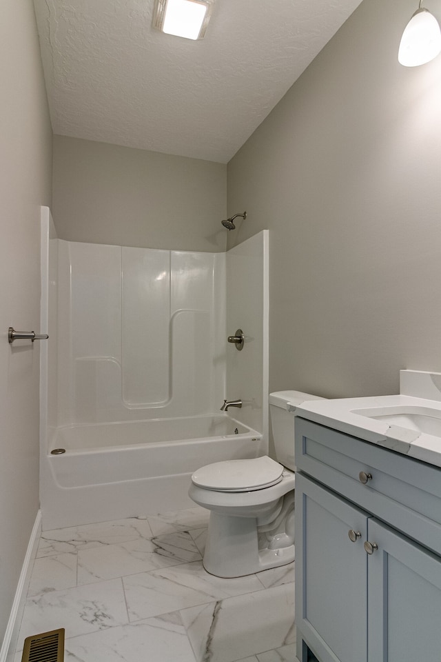 full bathroom with shower / washtub combination, a textured ceiling, vanity, and toilet