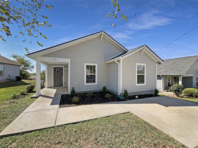 view of front of home with a front yard