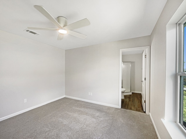 unfurnished room with carpet floors and ceiling fan