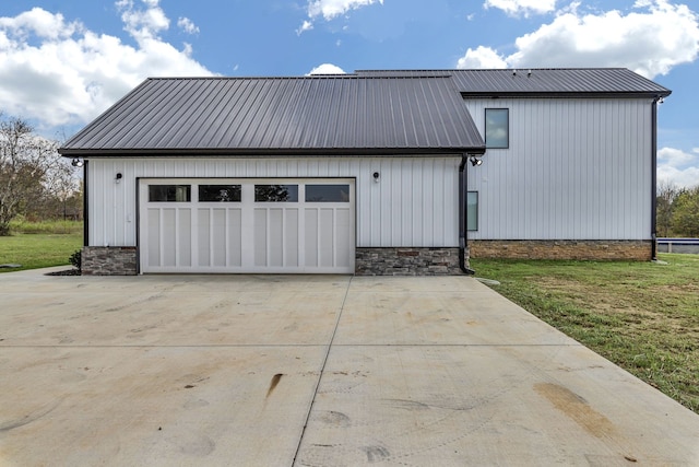 garage featuring a yard