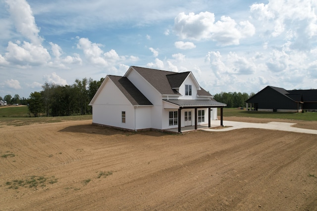 view of front of home featuring a porch