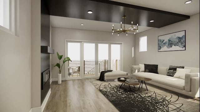 living room with an inviting chandelier, baseboards, wood finished floors, and recessed lighting