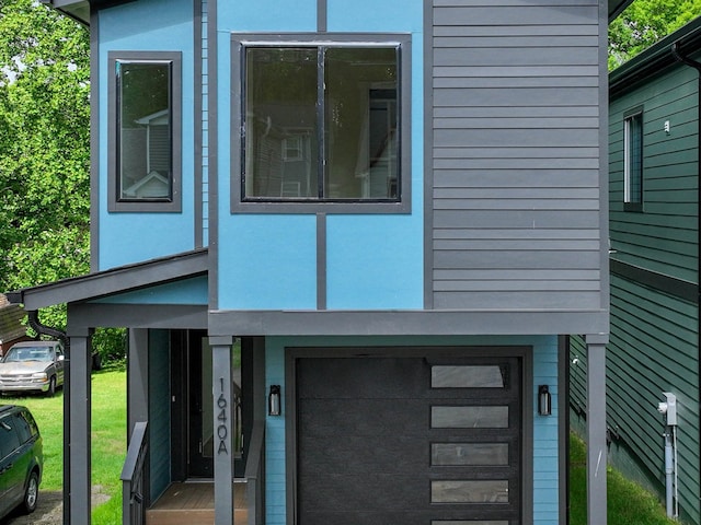 view of side of property featuring stucco siding