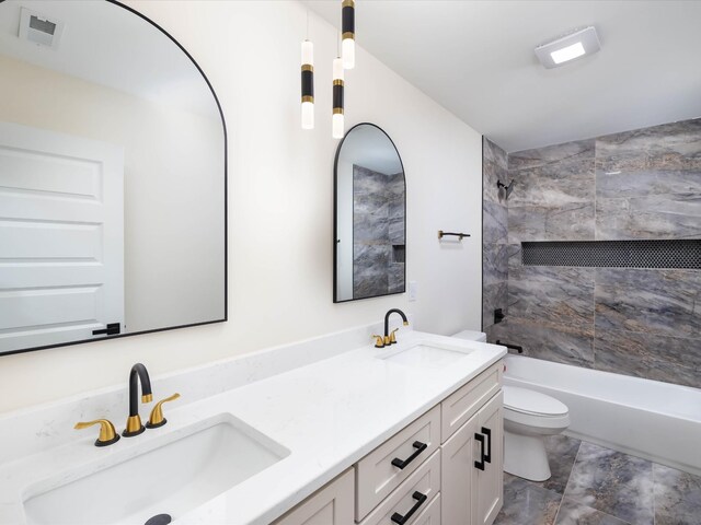 full bathroom with double vanity, visible vents, shower / washtub combination, and a sink