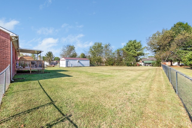 view of yard featuring a deck