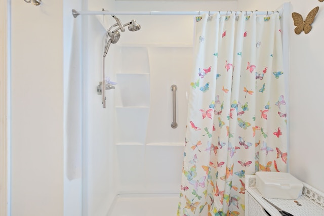 bathroom with a shower with curtain