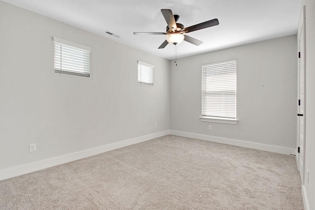 202 Summit St, Woodbury, TN 37190 - carpeted empty room with ceiling fan, baseboards, and visible vents
