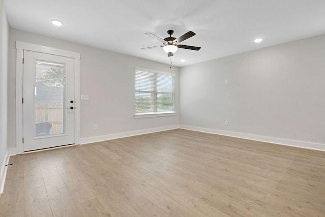 interior space featuring ceiling fan and light hardwood / wood-style flooring