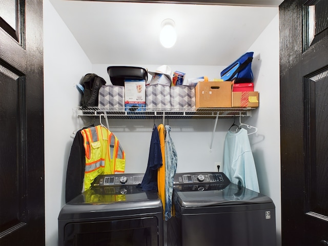 interior space with washer and clothes dryer