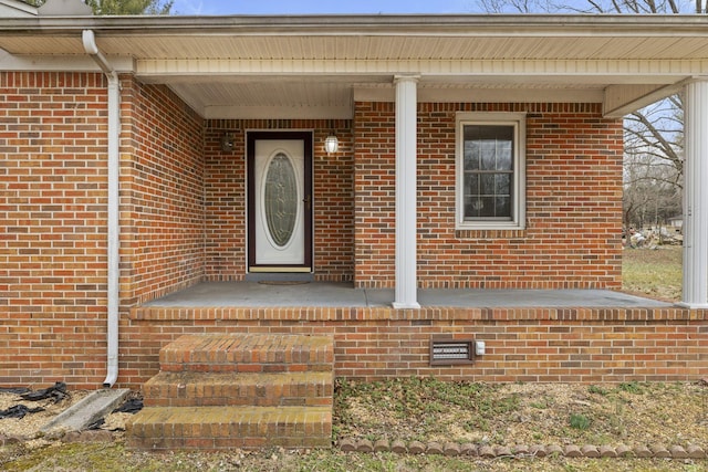 doorway to property featuring covered porch