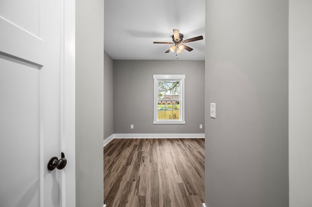 unfurnished room featuring wood-type flooring and ceiling fan