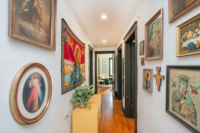 hallway featuring hardwood / wood-style floors