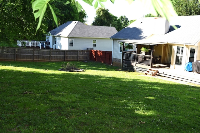 view of yard featuring a deck