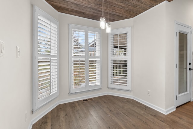 unfurnished dining area featuring wood ceiling, a chandelier, and wood-type flooring