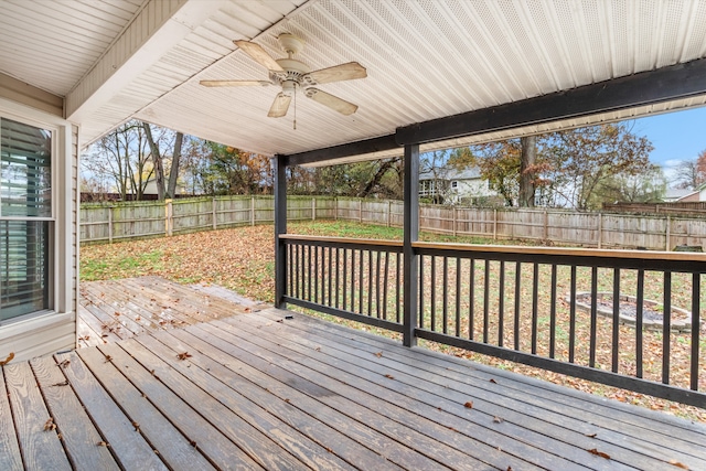 wooden terrace featuring ceiling fan