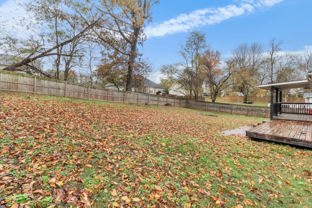 view of yard with a deck