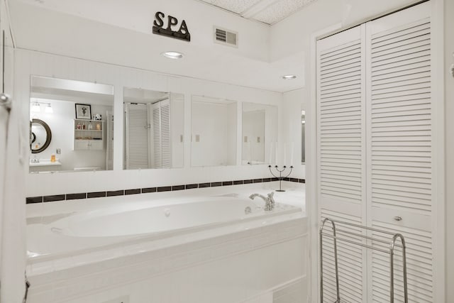 bathroom featuring a bathing tub