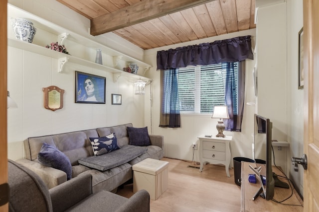 living room featuring light hardwood / wood-style floors, wood ceiling, and beamed ceiling