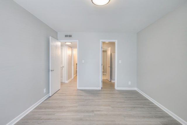 unfurnished bedroom with light hardwood / wood-style floors