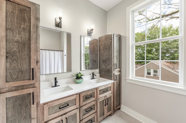 bathroom featuring vanity and tile patterned floors