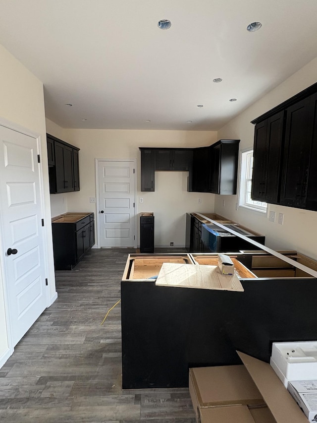 kitchen with dark hardwood / wood-style floors