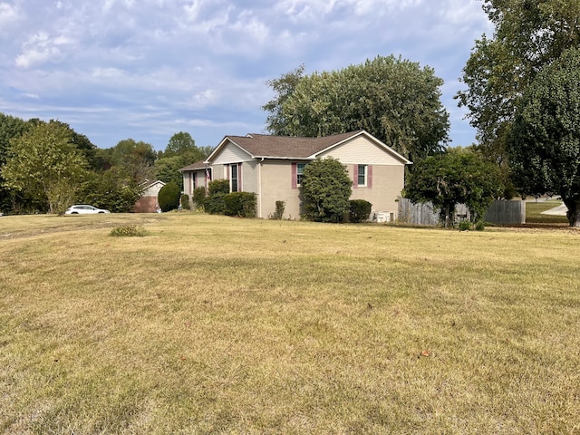 exterior space featuring a front lawn