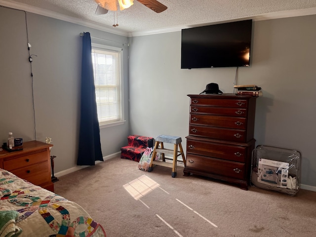 bedroom with a textured ceiling, ornamental molding, ceiling fan, and light colored carpet