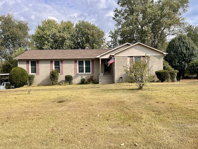 single story home featuring a front yard