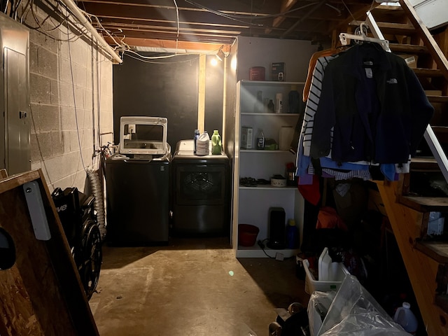 basement with washing machine and clothes dryer