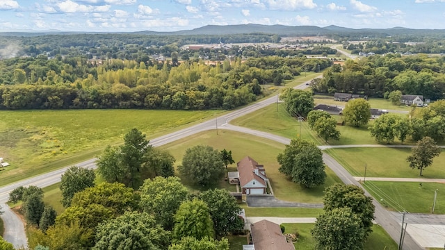 aerial view featuring a rural view and a mountain view