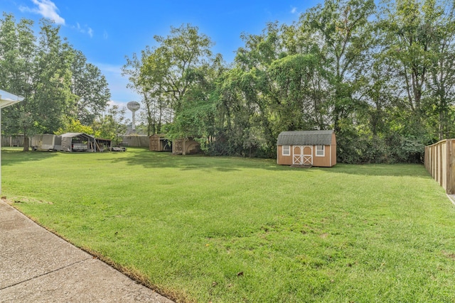 view of yard with a storage shed