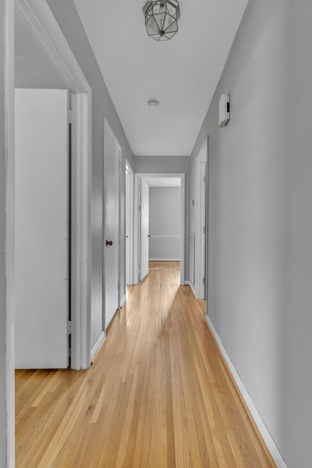 hallway featuring light wood-type flooring