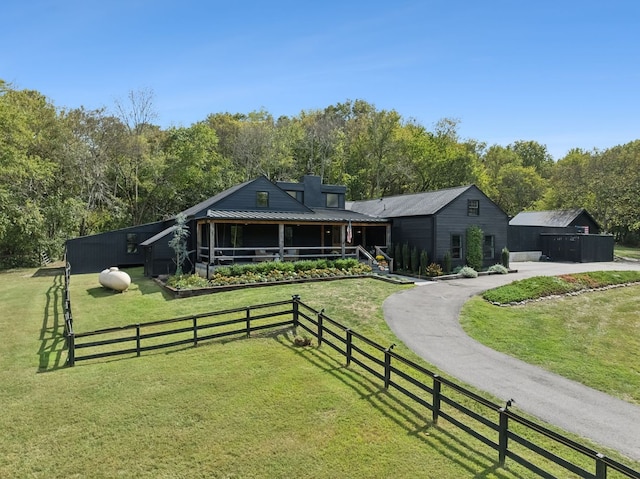 view of front of home with a front yard