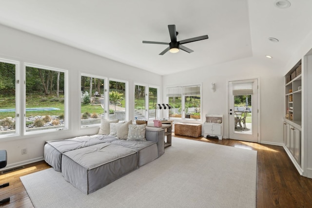 interior space featuring ceiling fan and plenty of natural light