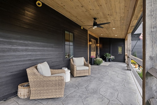 view of patio / terrace featuring ceiling fan