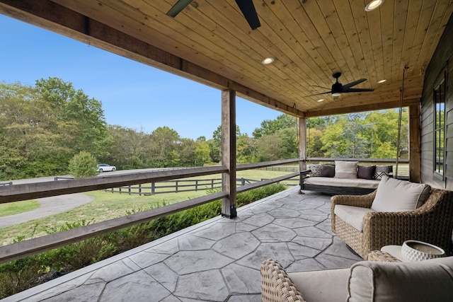 view of patio featuring ceiling fan