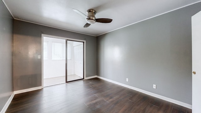 spare room with ceiling fan, crown molding, and dark hardwood / wood-style flooring