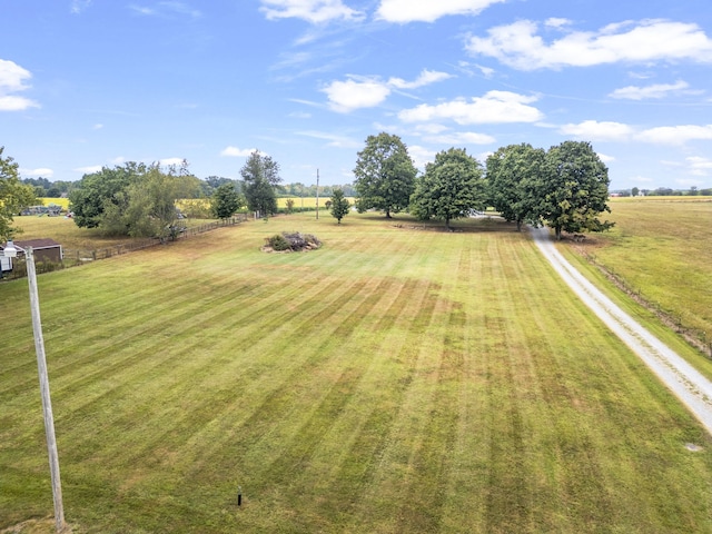 view of yard with a rural view