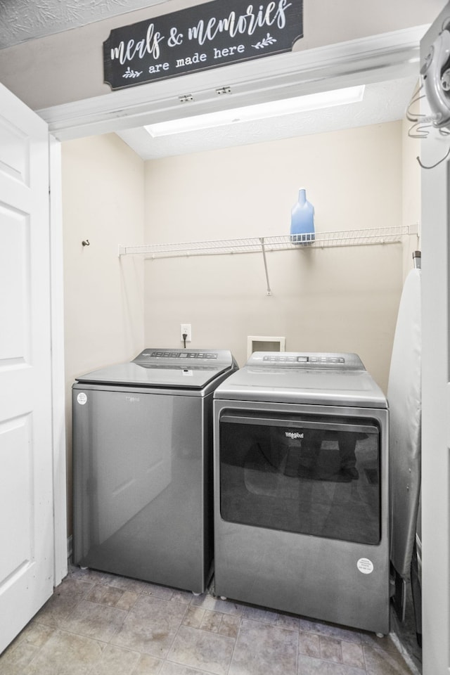 laundry room featuring independent washer and dryer