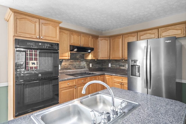 kitchen featuring decorative backsplash, black appliances, a textured ceiling, and sink