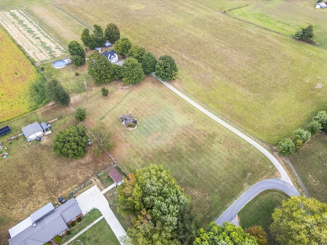 birds eye view of property featuring a rural view