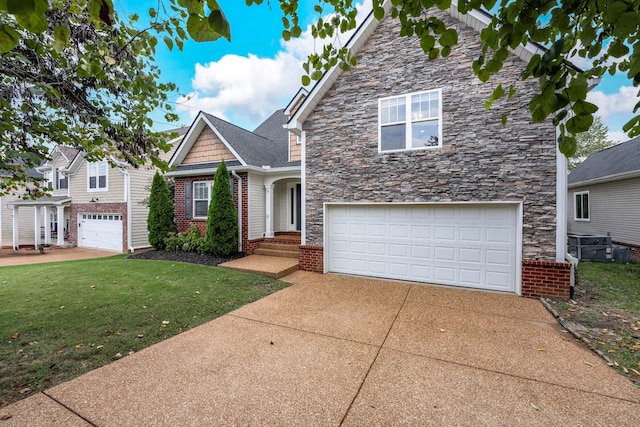 view of front of home featuring a garage and a front yard