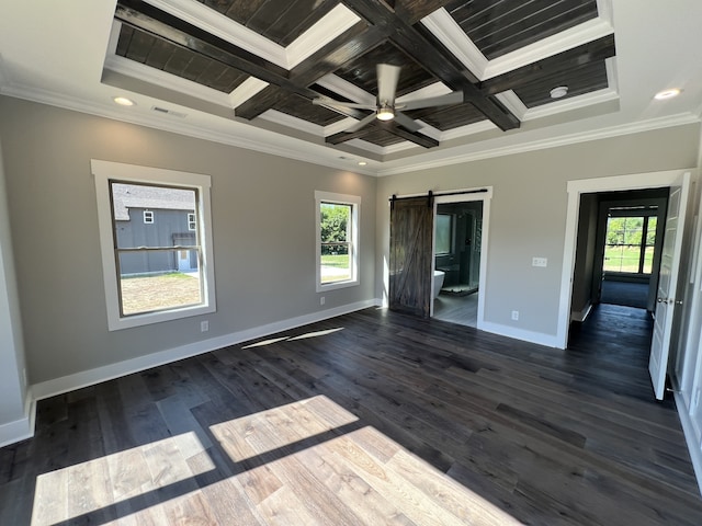 unfurnished bedroom featuring a barn door, ornamental molding, coffered ceiling, and dark hardwood / wood-style flooring