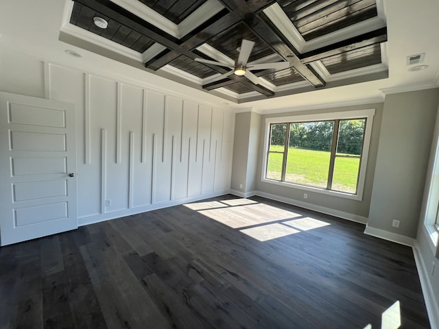 unfurnished room with dark hardwood / wood-style floors, beam ceiling, coffered ceiling, crown molding, and ceiling fan